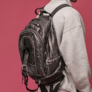 BACKPACK WITH LEATHER STRAPS